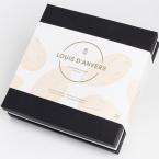 boîte en carton noire avec 28 pralines artisanales fourré à la pâte d’amande