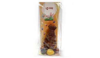 sachet avec un lapin de Pâques en chocolat complété de petits oeufs